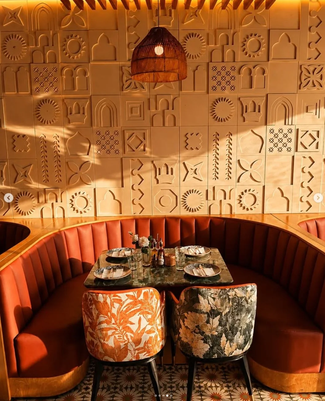 Taste of Village booth seating and patterned feature wall